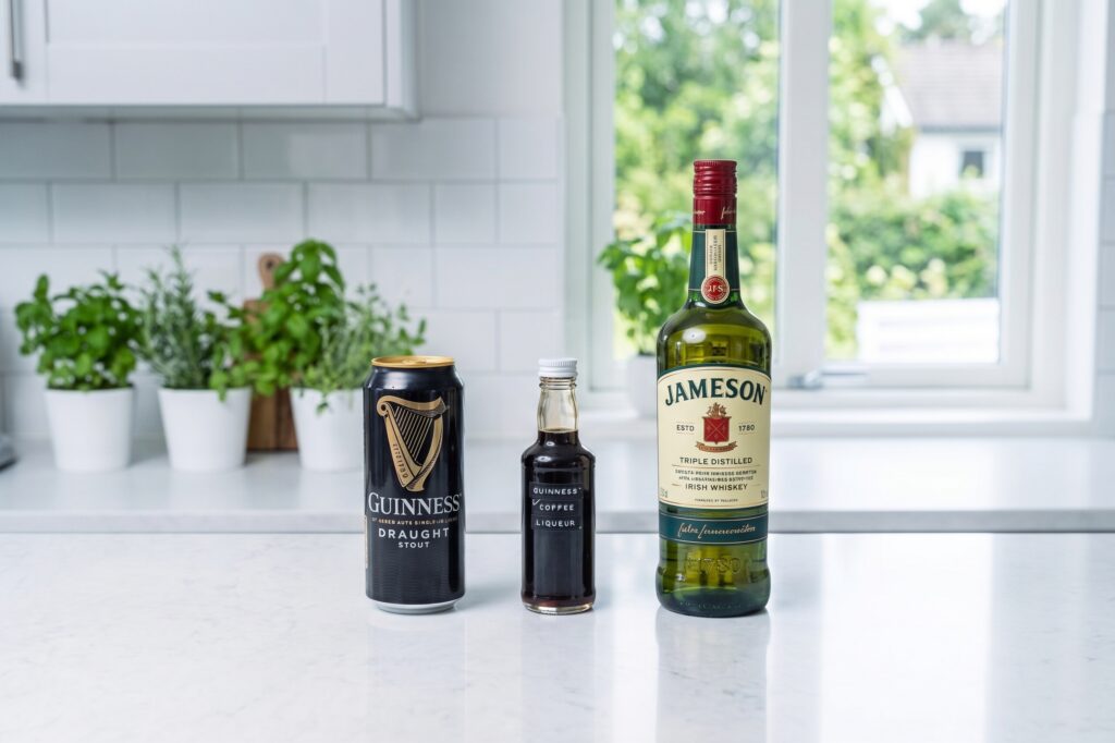 A can of Guinness, a bottle of Jameson, and a bottle of DIY Coffee Liqueur